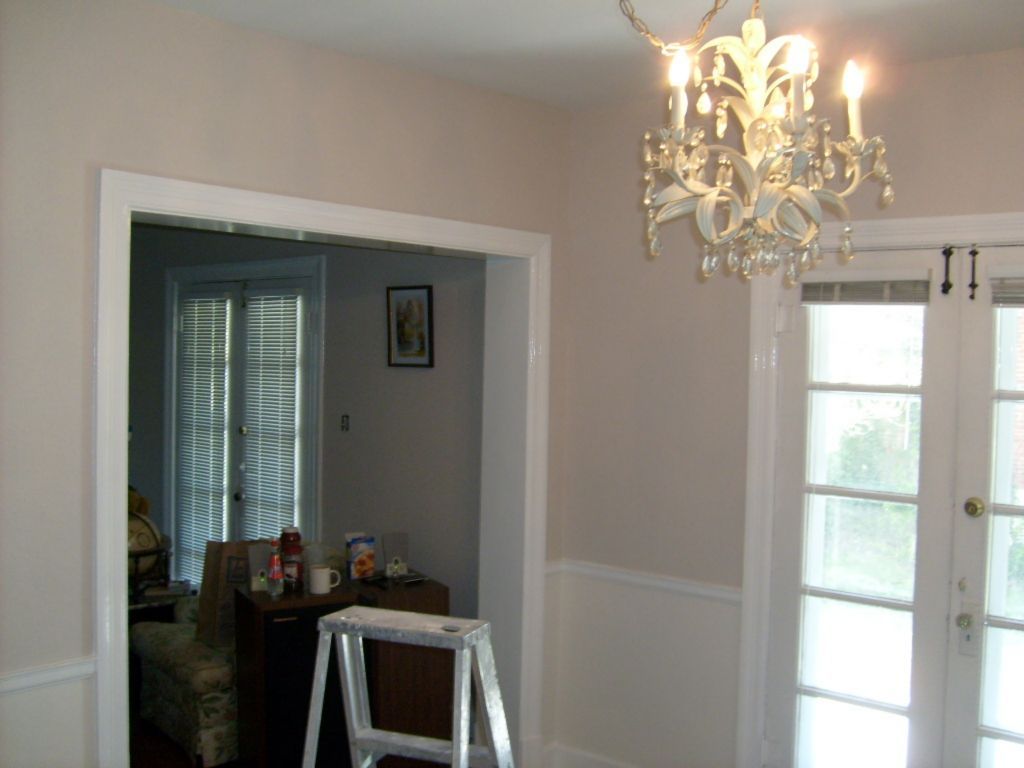 Completed dining room. Painted woodwork with primer and white semigloss oil. stippled and painted walls.